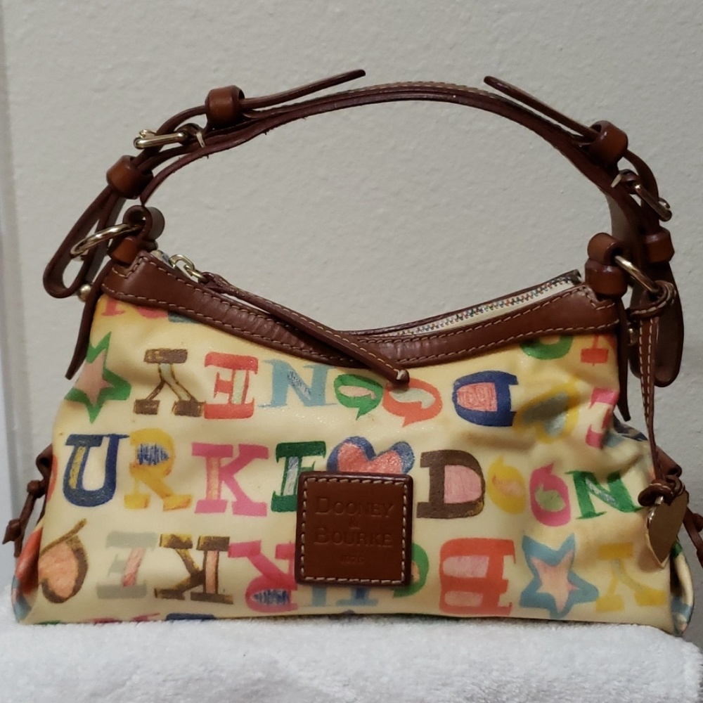 Gently used vintage Dooney & Bourke small handbag